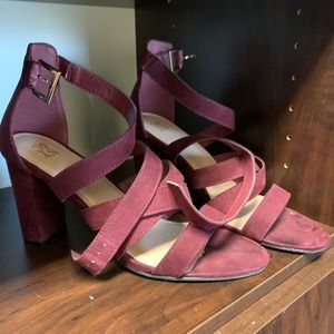 Strappy high heeled chunky heeled sandals.
